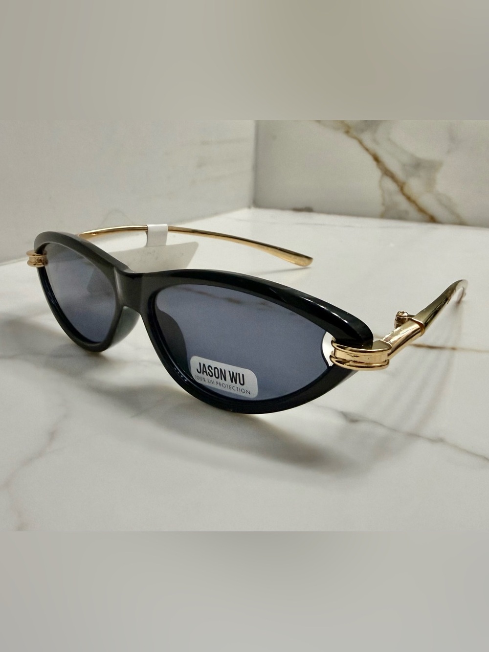 FREE Jason Wu Black Cat-Eye Sunglasses with a $400 purchase coach case